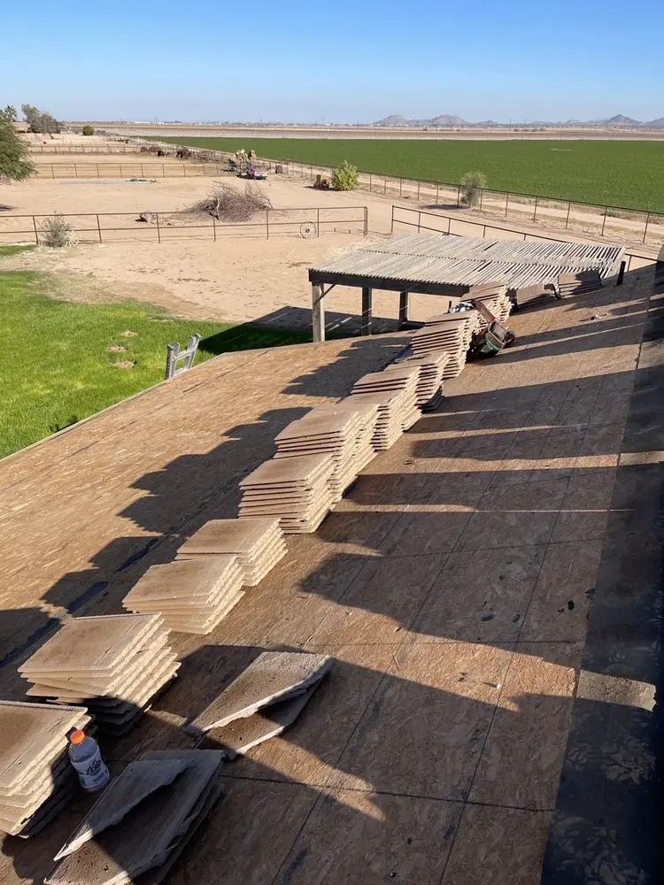 Concrete tile roof torn off to new decking on a rural horse property near Queen Creek, by Leal Roofing
